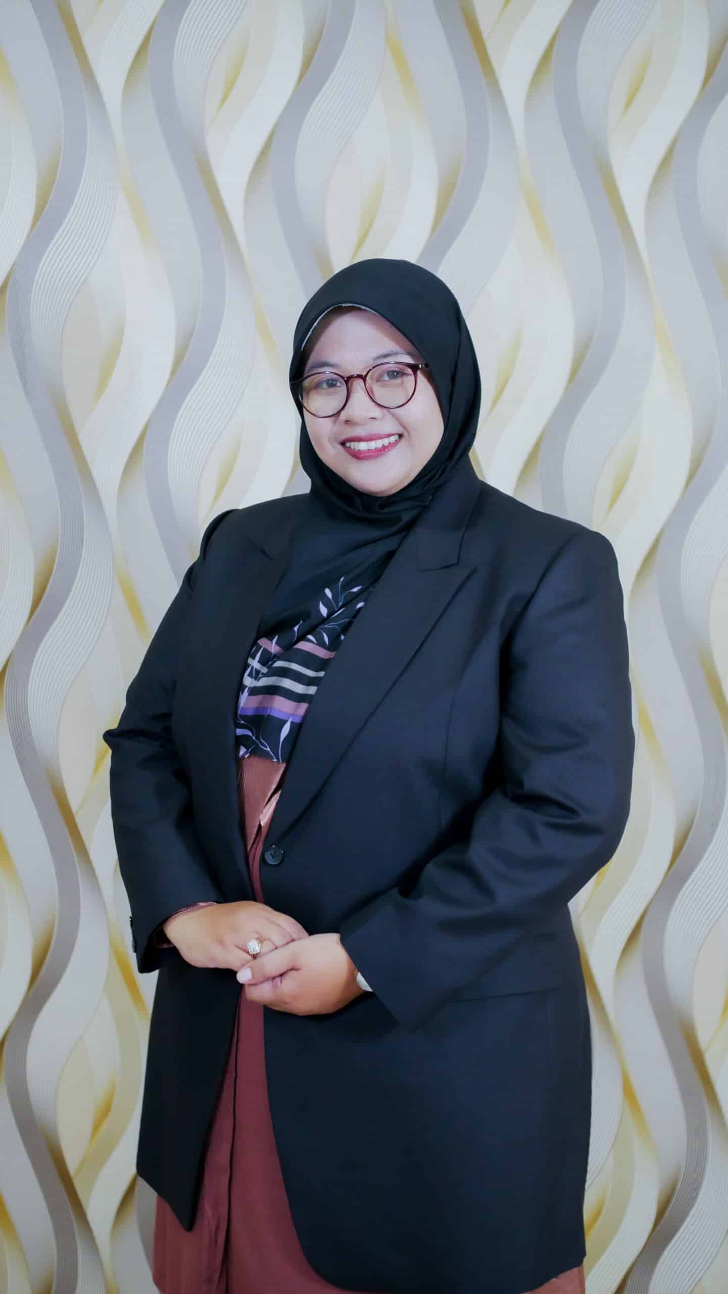 Dr. Ari Kartini, M.Pd.